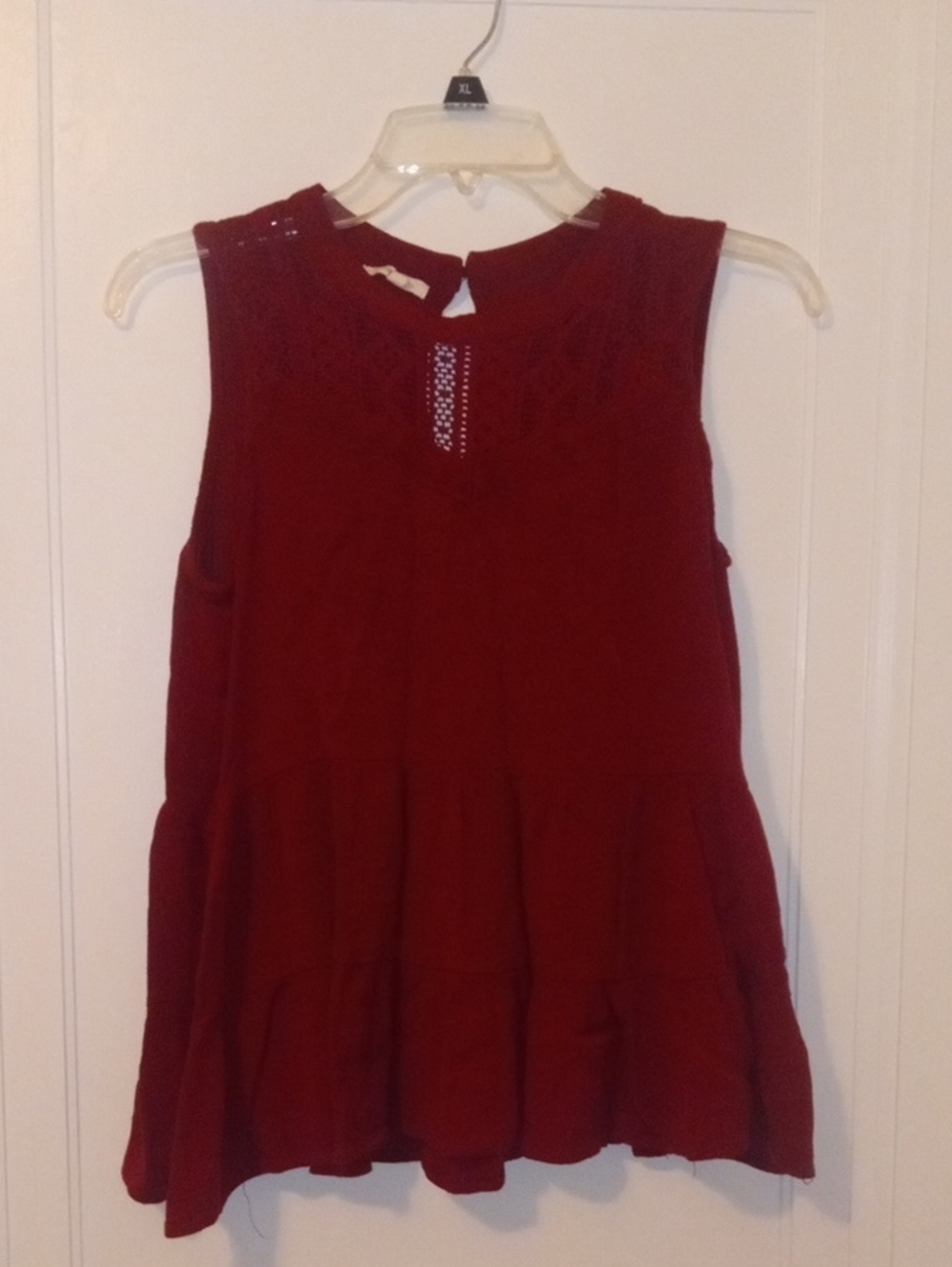 women med sleeveless burgundy peplum top Maurices